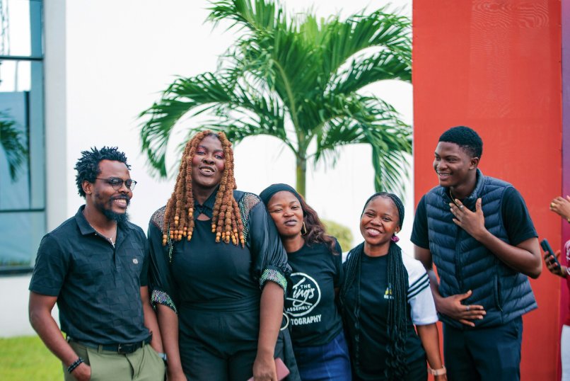 Group of students laughing together outdoors